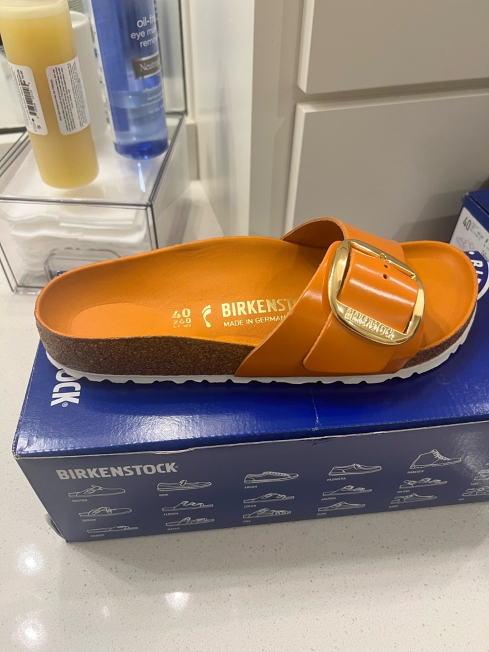 Birkenstock Orange Slide Sandals with Gold Buckle Accent - Picture 2 of 3